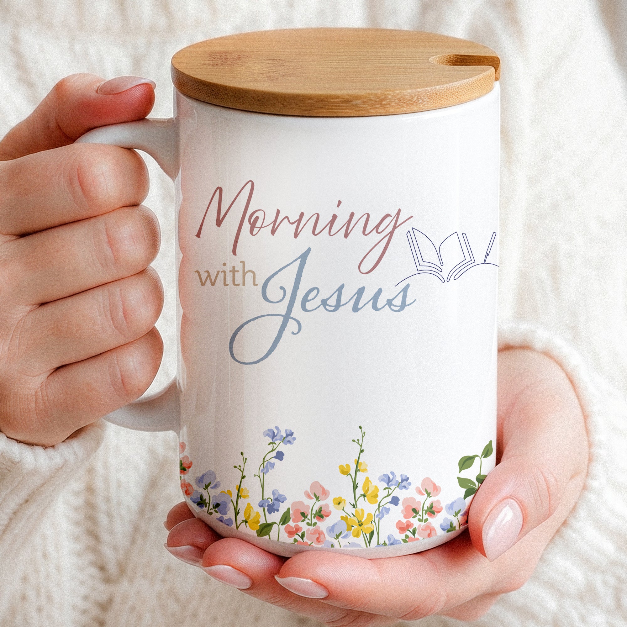 Personalized Christian coffee mug for women featuring a minimalist wildflower design and the text "Mornings with Jesus", shown as an elegant 15oz mug set with a bamboo lid and gold spoon on a clean background.
