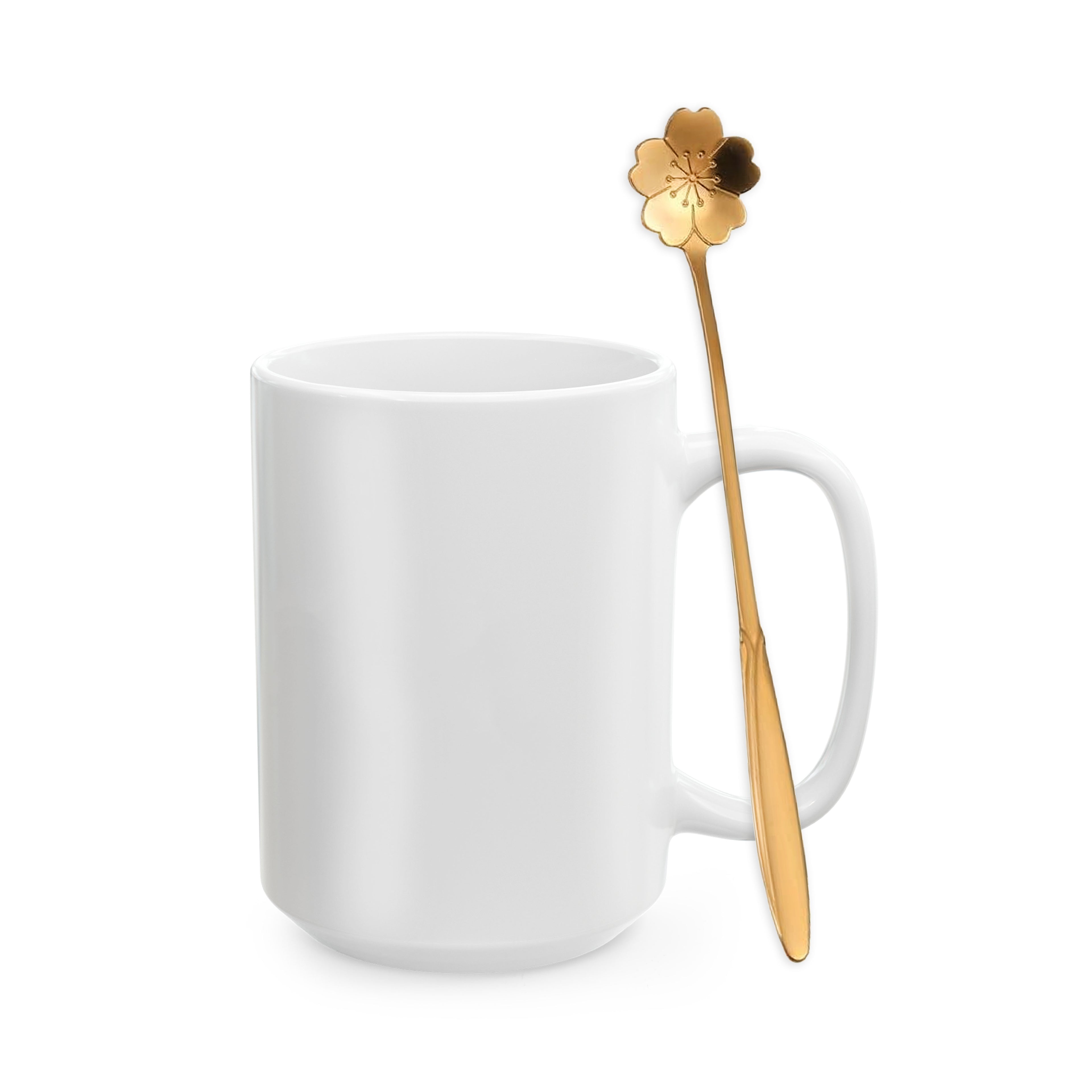 White mug with a gold spoon featuring a floral design on a white background