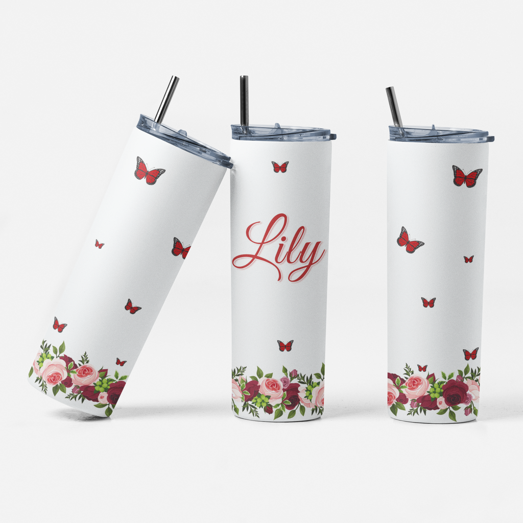 Three white tumblers with floral and butterfly designs on a white background